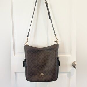 Brand New Coach Purse/Bag with Adjustable Straps. Never Used.